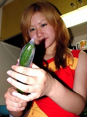 Naughty asian amateur teen puts carrot and cucumber in her tight pussy